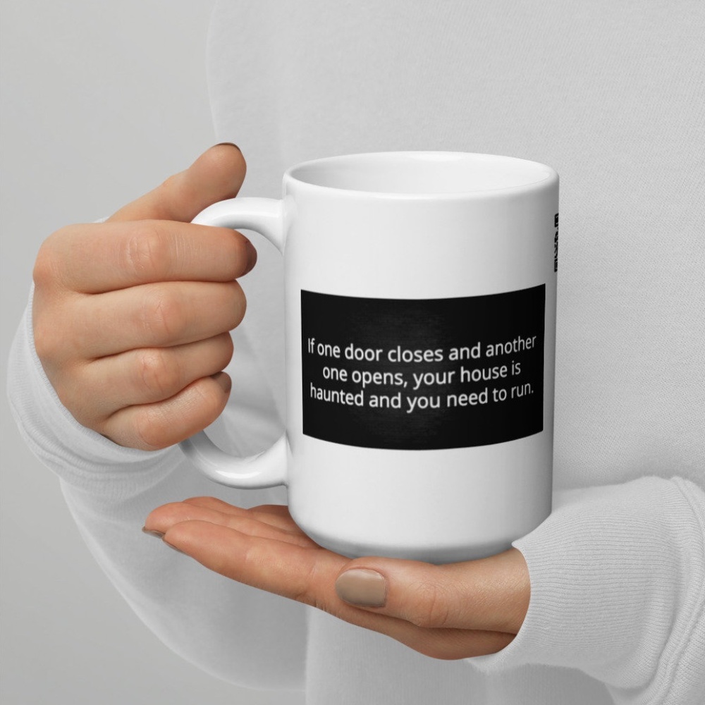 If One Door Closes Your House Is Haunted White Glossy Coffee Mug